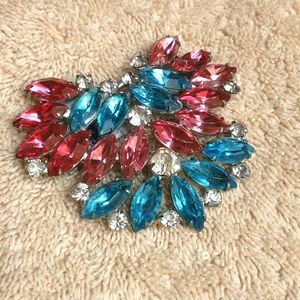 Vintage 50's Pink, white, and blue rhinestone brooch.